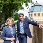 Angelika Taube und André Thieme auf der Festung Königstein, im Hintergrund die Friedrichsburg